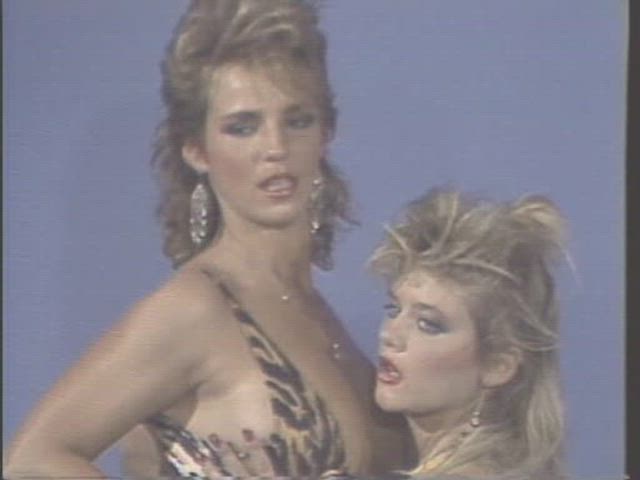 Erica Boyer and Ginger Lynn posing for Marc Wallice in "Modeling Studio" (1984)